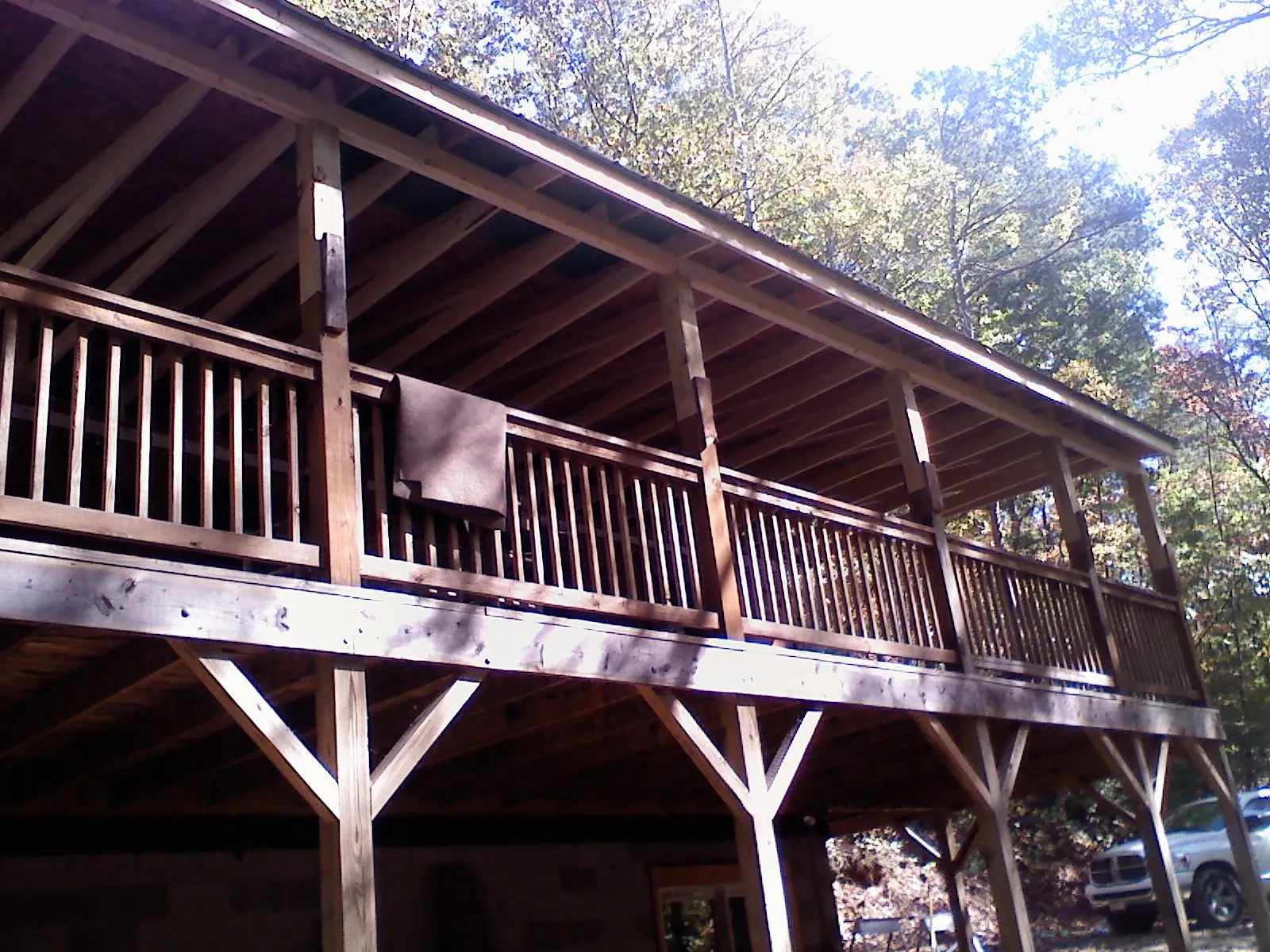 Timber framing under a new elevated porch and deck — Roof Leak Repair in Capon Bridge by Roofing Brothers